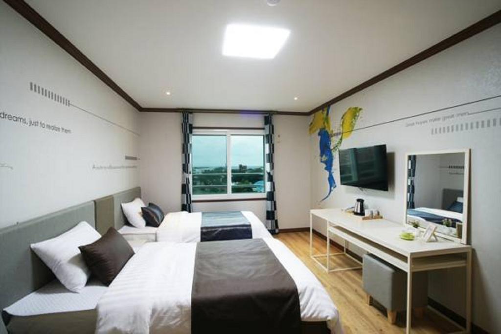 Seongsan Aqua Beach Hotel Σεογκουίπο Δωμάτιο φωτογραφία