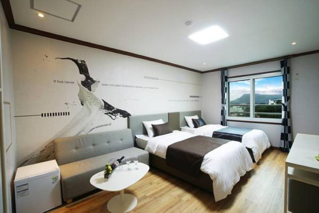 Seongsan Aqua Beach Hotel Σεογκουίπο Δωμάτιο φωτογραφία